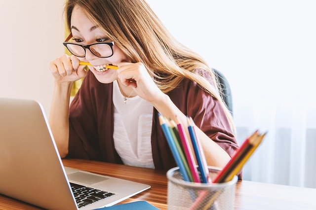 Girl studying on laptop